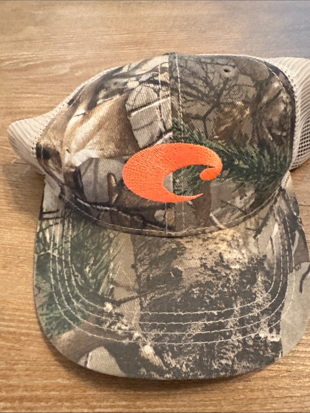 Costa Black and Tan Mesh Back Trucker Hat with Orange Logo